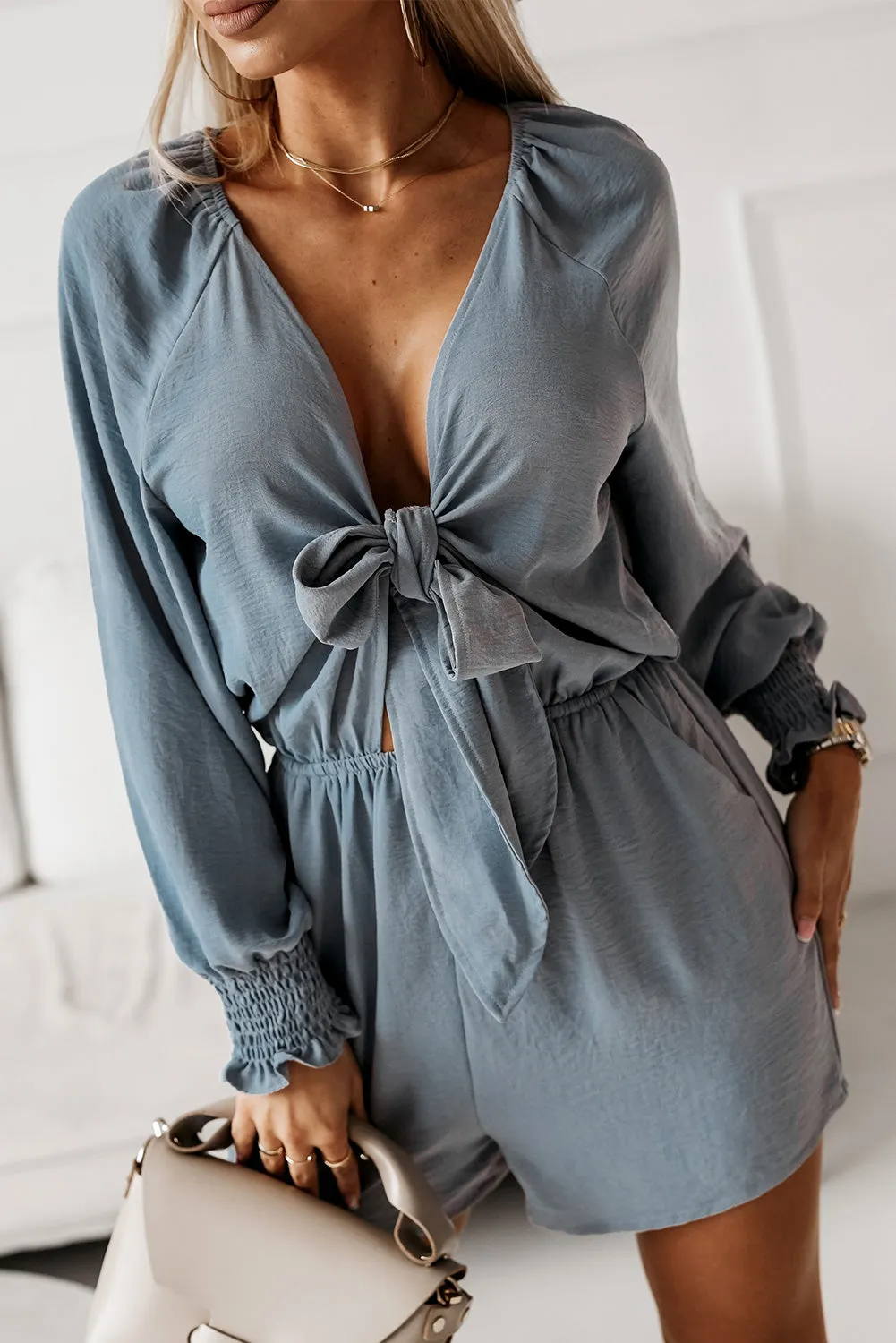 *APP EXCLUSIVE* Tied Flounce Sleeve Plunge Romper