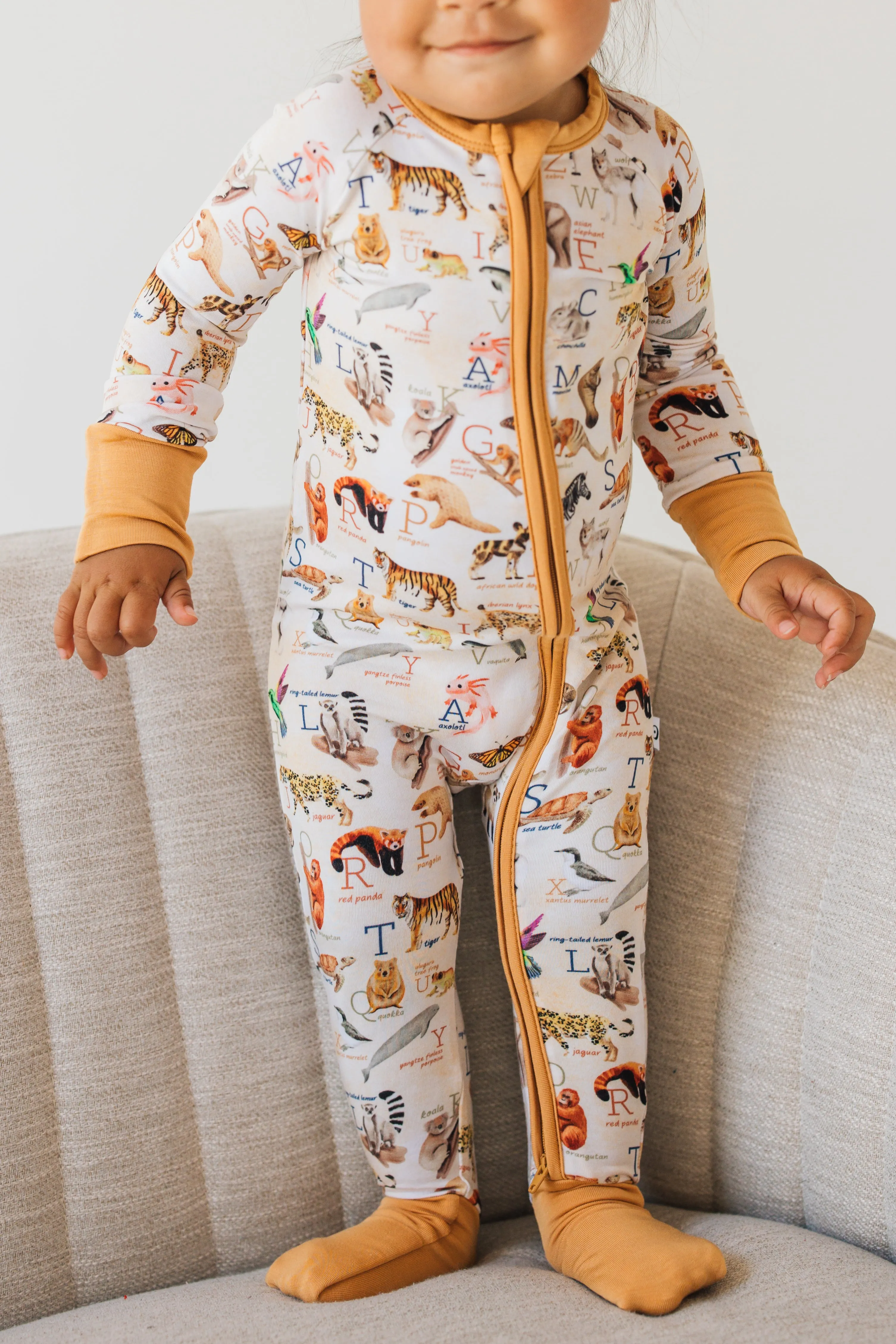 Endangered Animals Alphabet Zip Romper