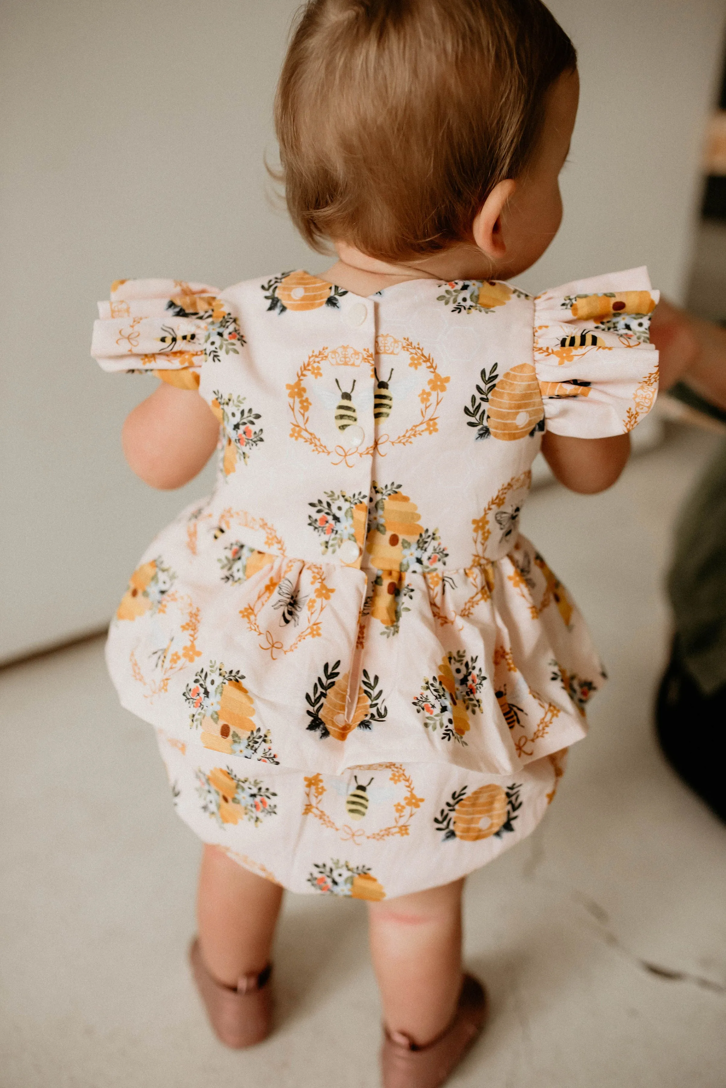 Infant Girl's Bee Print Peplum Bubble Romper