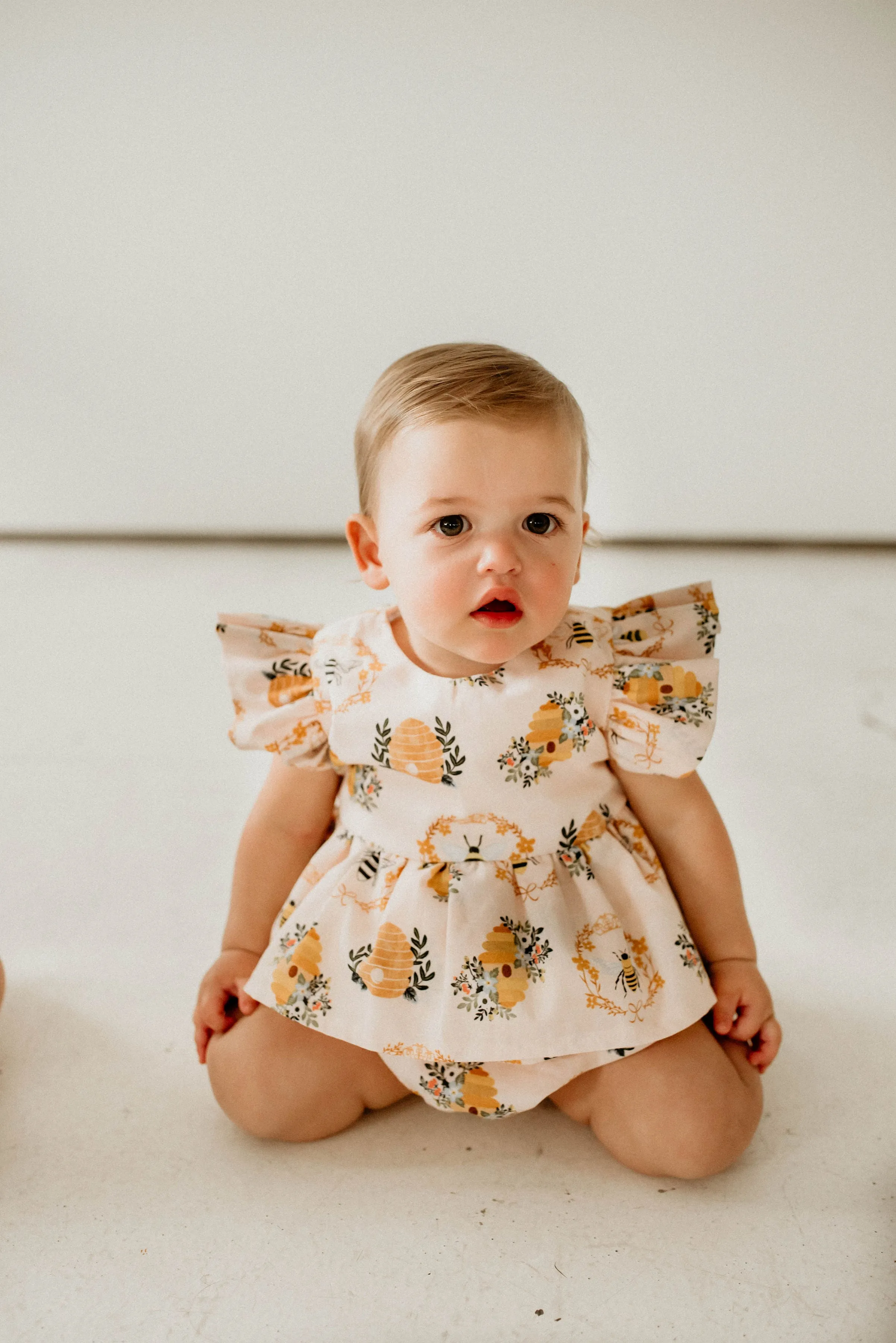 Infant Girl's Bee Print Peplum Bubble Romper