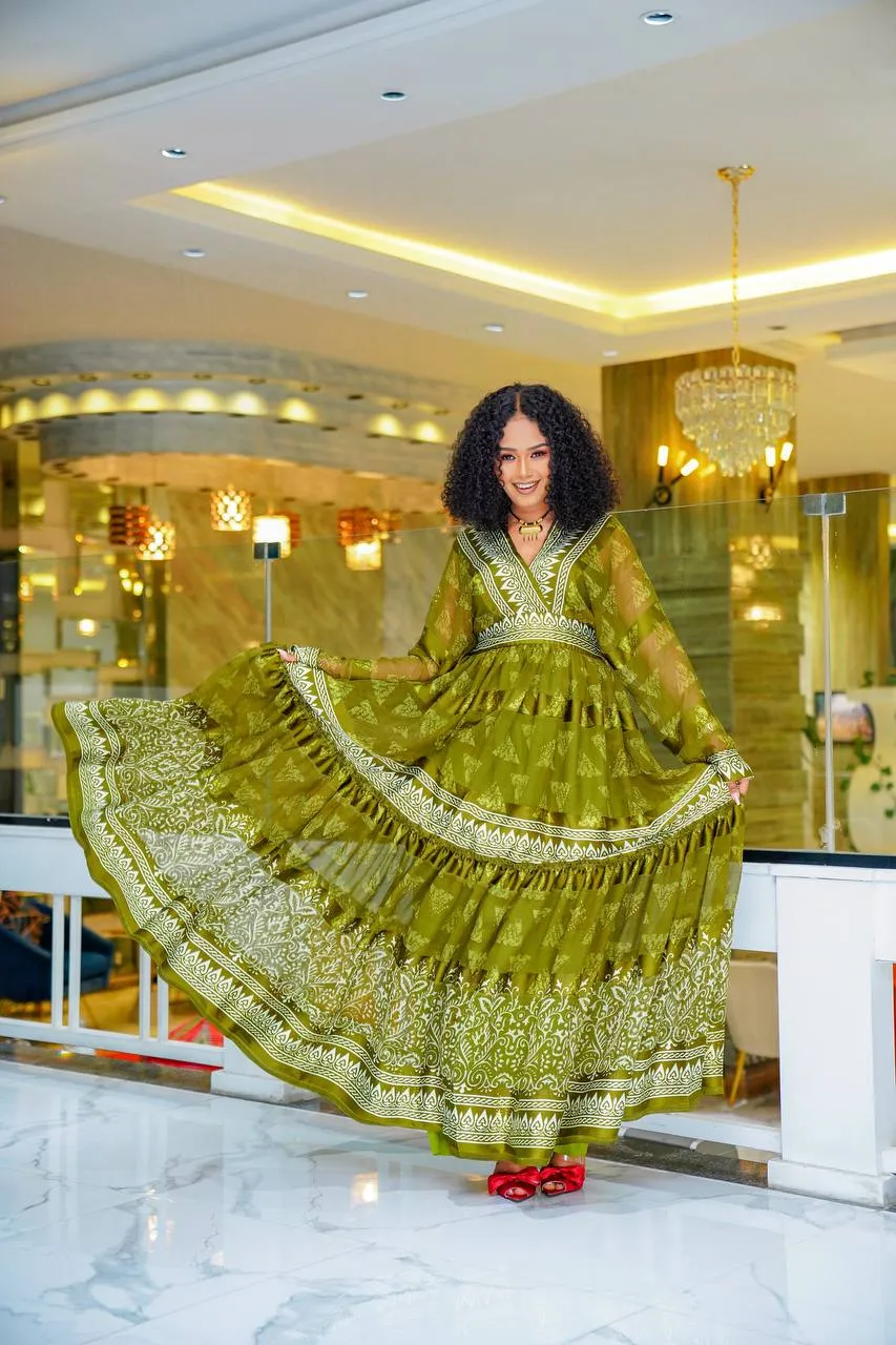 Olive Green Modern Design Habesha Chiffon: with Eye Catching Patterns Ethiopian Made Chiffon Dress