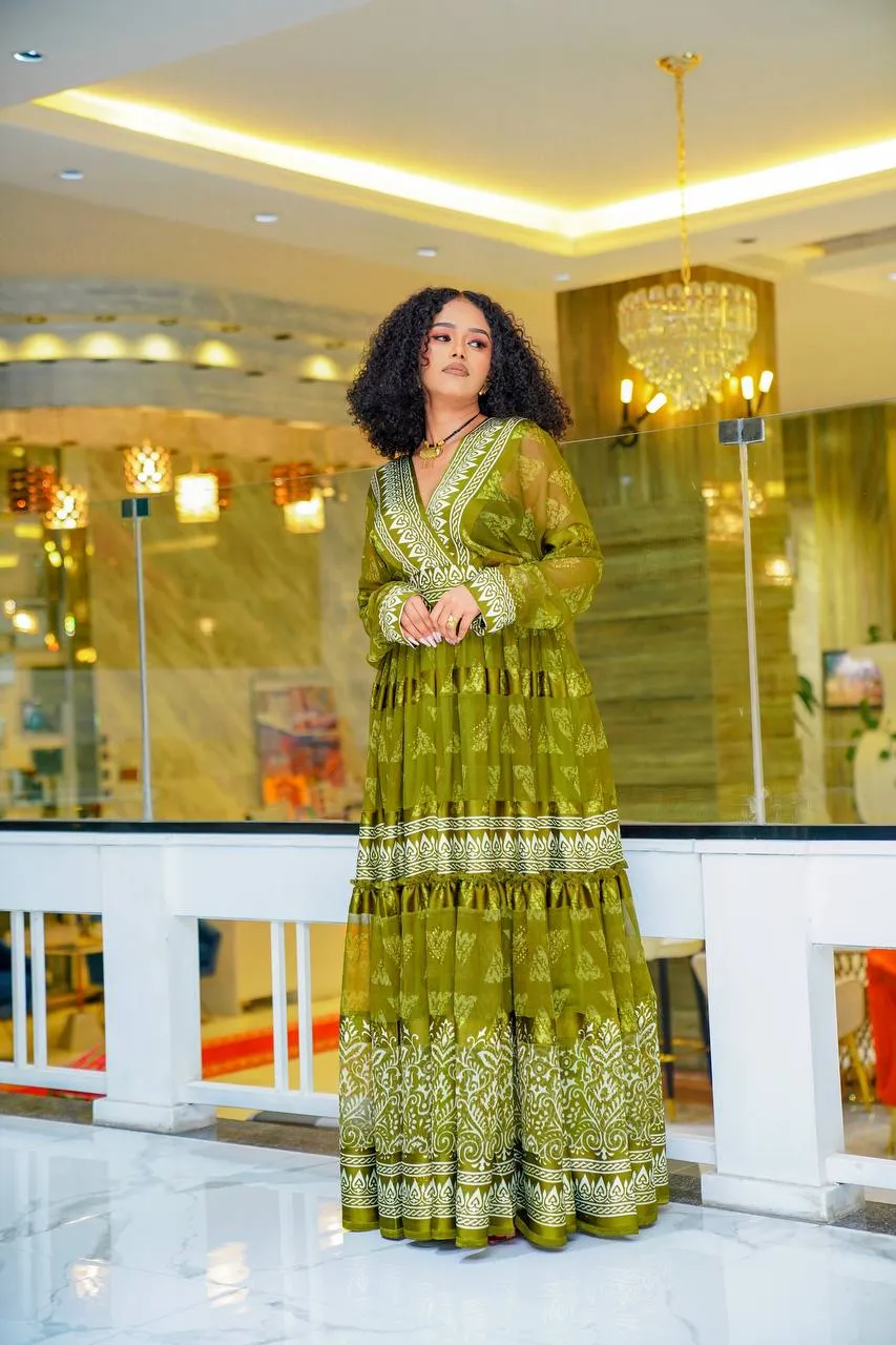 Olive Green Modern Design Habesha Chiffon: with Eye Catching Patterns Ethiopian Made Chiffon Dress